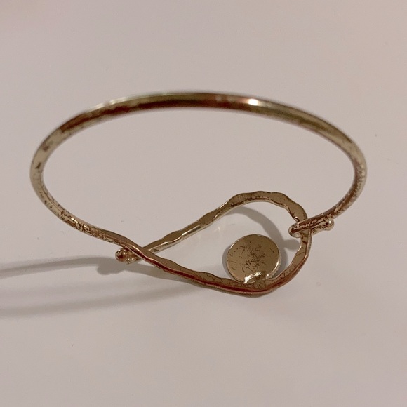 Gold tone bangle bracelet with eye - Picture 3 of 3